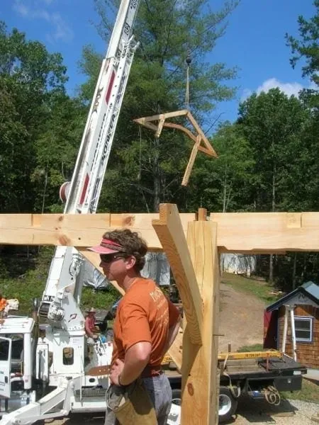 Timber frame raising with mortise-and-tenon joinery on a Virginia custom home build